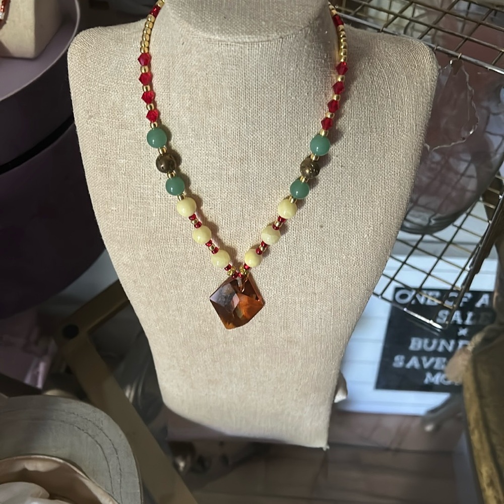 Amber Crystal pendent on beads including jade and